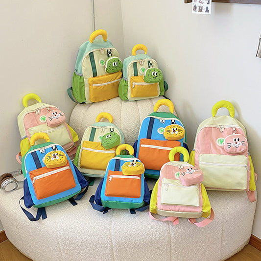 Trendy Color-Block Kids' Backpack with Cute Cartoon Design